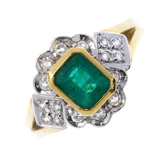 An 18ct gold emerald and diamond cluster ring. The rectangular-shape emerald collet, with single-cut