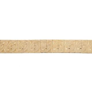 A foliate panel bracelet. Designed as a series of foliate panels, to the push-piece clasp. Length 19