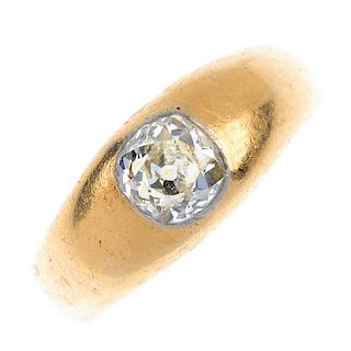 A gentleman's late 19th century 18ct gold diamond single-stone ring. The old-cut diamond, inset to t