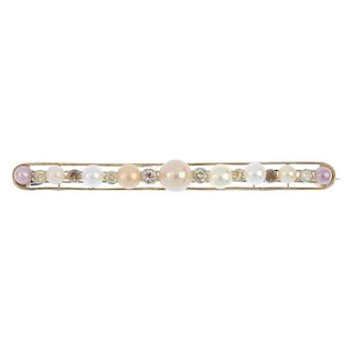 A cultured pearl and bar brooch. The graduated cultured pearl line, measuring 6 to 3mms, with brilli