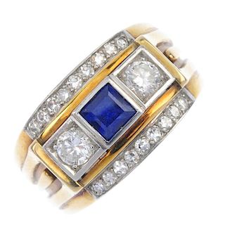 A sapphire and diamond dress ring. The square-shape sapphire, with brilliant-cut diamond sides, to t