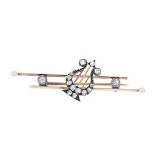 A late 19th century silver and gold diamond and seed pearl brooch. The old-cut diamond lyre, to the