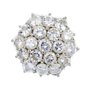 A diamond cluster ring. The brilliant-cut diamond, within a similarly-cut diamond double surround, t