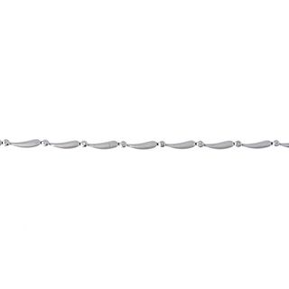 A diamond bracelet. Designed as a series of brilliant-cut diamond collets, with tapered bar spacers,
