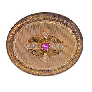 A late 19th century 15ct gold ruby and split pearl brooch. The oval-shape ruby and split pearl cross