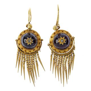 A pair of mid 19th century gold garnet and diamond ear pendants. Each designed as a circular-shape f