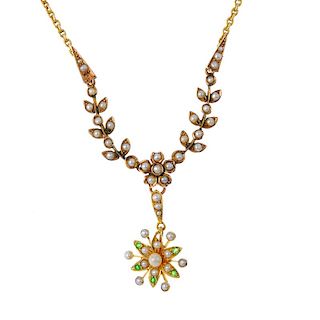An early 20th century 9ct gold, demantoid garnet, seed and split pearl necklace. Designed as a seed