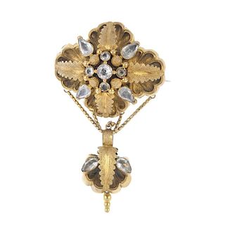 A mid 19th century gold rock crystal brooch. Designed as a circular and pear-shape foil-back rock cr
