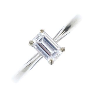 A diamond single-stone ring. The rectangular-shape diamond, to the tapered band. Estimated total dia
