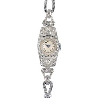 A lady's early 20th century platinum, 9ct gold and diamond manual wind cocktail watch, with later re