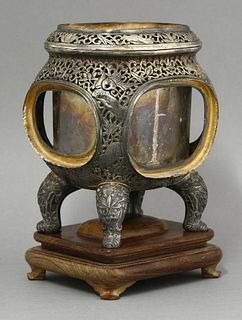 A well decorated silver Incense Burner and Cover