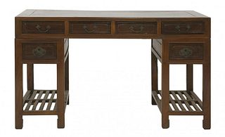 An hardwood pedestal Desk early 20th century with a
