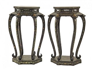 A pair of large lacquered urn stands each hexagonal
