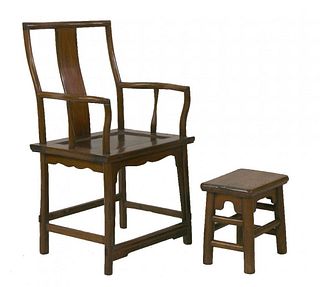 A hardwood Armchair 19th century with shaped back and