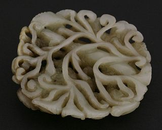 A jade Plaque c.1900 the pale celadon stone carved