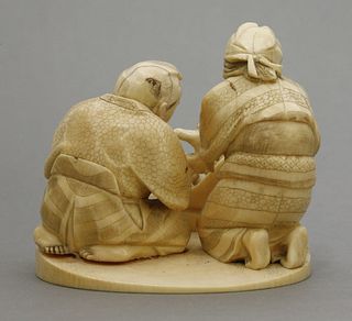 An attractive ivory Okimono c.1880 of Momotaro the