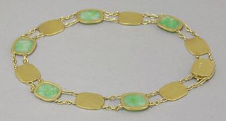 A gold and jadeite Necklace 20th century formed of