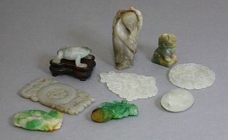 Nine jade carvings 20th century six pendants a Dog