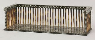 An Indian inlaid ebony and porcupine quill bookrack,
