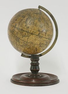 A celestial table globe, 19th century, paper on wood,