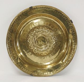 A brass alms dish, Nuremberg, 16th century, the central