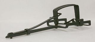 An antique iron mantrap, 77cm long 35cm wide 26cm jaws