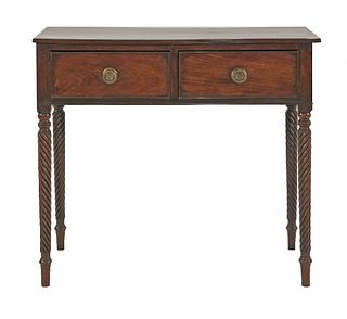 An Irish mahogany side table, early 19th century, with