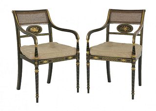 A pair of Regency-style ebonised and gilt open