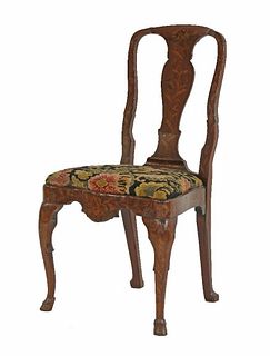 A marquetry side chair, 18th century, profusely inlaid