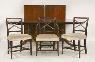 A mahogany twin pedestal dining table, with two extra