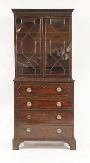 A George III mahogany secretaire, of small proportions,