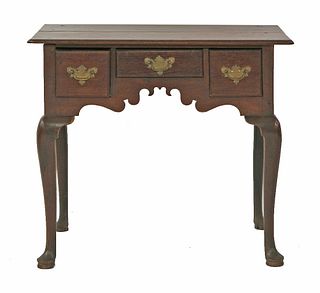 A walnut lowboy, 18th century, with three drawers and