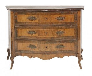 A Continental walnut commode, 18th century, with wide