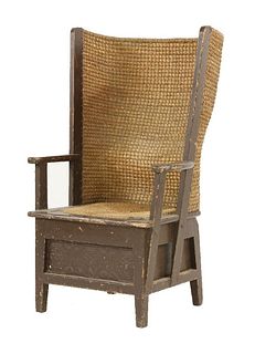 An Orkney armchair, the basket back over a removable