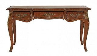 A Louis XV style gilt bronze mounted kingwood bureau