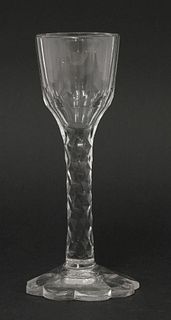 A Wine Glass, c.1790, the ogee bowl cut with vertical