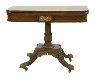 A Regency rosewood and brass inlaid card table, having