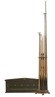 A Victorian oak revolving cue stand, for twelve cues,