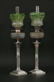 A pair of Victorian silver-plated Corinthian column oil