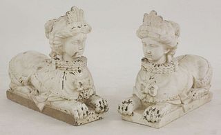 A pair of sphinxes, each carved wood and painted, 62cm