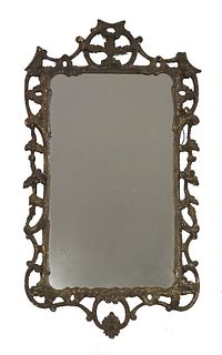 A carved giltwood rococo mirror, mid 18th century, the