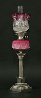 A Victorian silver-plated Corinthian carved oil lamp,