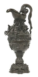 A bronze ewer, modelled with nautical motifs, the spout