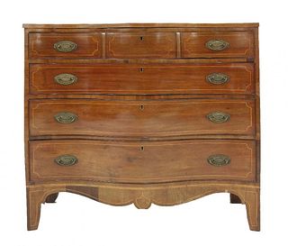 A George III mahogany serpentine-fronted four-drawer