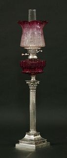 A silver-plated Corinthian column oil lamp, with a