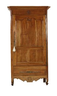 A French cherrywood armoire, late 18th century, the