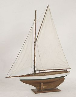 A pond yacht, 20th century, named on a stamped plate