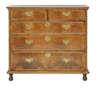 A walnut veneered and oak chest of drawers, 18th