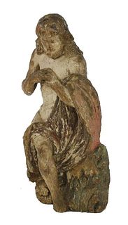 A carved polychrome figure of John the Baptist, 16th