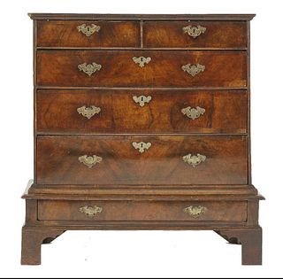 A walnut and crossbanded chest on stand, early 18th